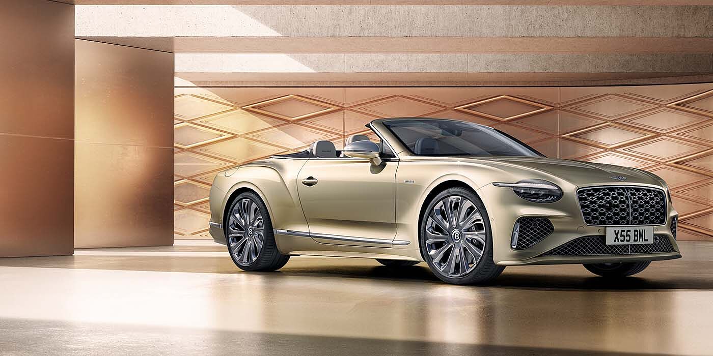 Jack Barclay Bentley New Continental GTC Mulliner V8 hybrid front three quarters in Patina paint