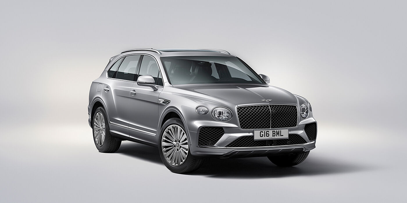 Jack Barclay Bentley Bentayga luxury SUV front three quarter view in Moonbeam paint with matrix grille and 21″ 5 spoke painted wheels