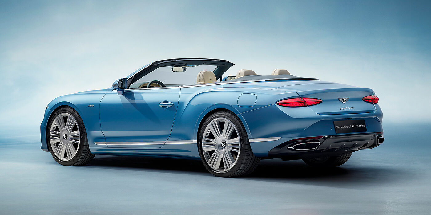 Jack Barclay New Bentley Continental GTC Azure convertible rear view in Light Windsor blue paint with 22 inch ten spoke wheels and chrome exterior details