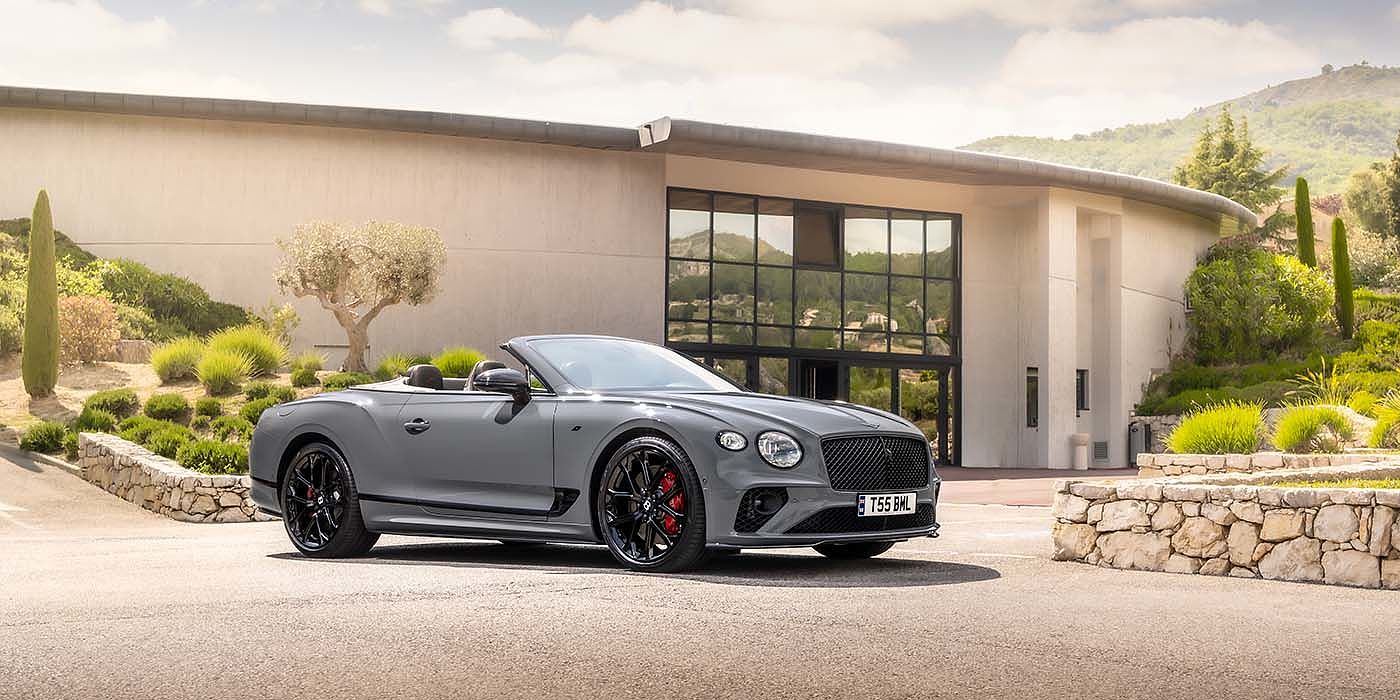 Jack Barclay Bentley Continental GTC S convertible in Cambrian Grey paint front 34 static near house