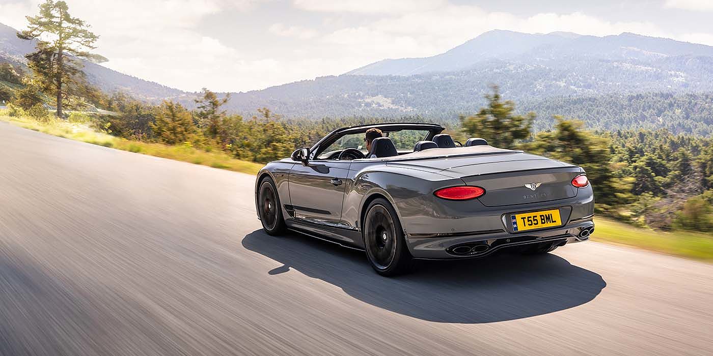 Jack Barclay Bentley Continental GTC S convertible in Cambrian Grey paint rear 34 dynamic driving