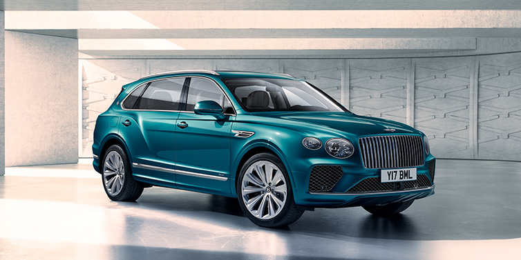 Jack Barclay Bentley Bentayga Extended Wheelbase Azure SUV front three quarter in Topaz blue paint colour with a grey background