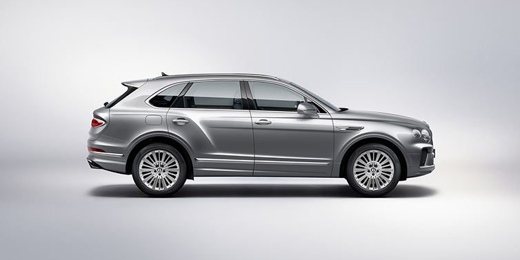 Jack Barclay Bentley Bentayga SUV side profile in Moonbeam silver paint against white background featuring 21 inch 5 spoke wheels