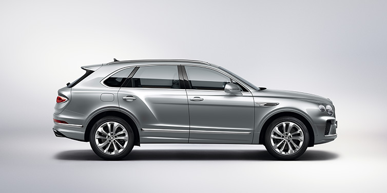 Jack Barclay Bentley Bentayga SUV side profile in Moonbeam silver paint against white background featuring 21 inch 5 spoke wheels