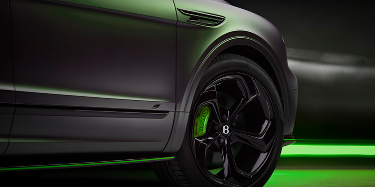 Jack Barclay Bentley Bentayga S Black Edition SUV exterior wheel detail with Cyber Green brakes with Anthracite Satin paint